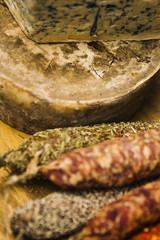 Variety of french dried sausages and cheese from Auvergne