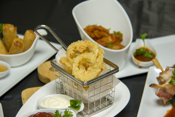 Tasty calamari rings deep fried in soft dough