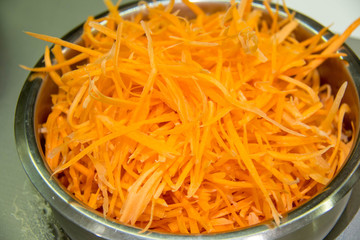 Carrot is cut into slices.