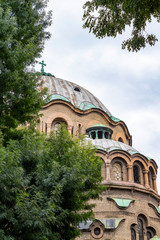 Fototapeta na wymiar The dome of the Eastern Orthodox Church of St. Paraskeva, the third-largest temple in Sofia, Bulgaria, architectural detail, exterior partial view