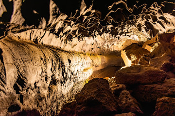 Water optical illusion reflection in Cueva de los Verdes, an amazing lava tube and tourist...