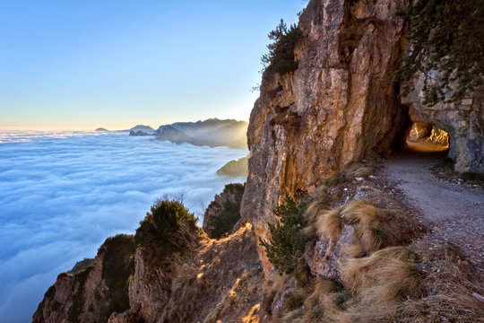 The Strada delle 52 Gallerie (Road of 52 tunnels) at sunset, Pasubio massif, Vicenza Province, Veneto, Italy, Europe.