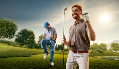 Male golf players on professional golf course. Happy player emotionally rejoices victory. Angry opponent sad about losing and broke his golf club on knee - obrazy, fototapety, plakaty