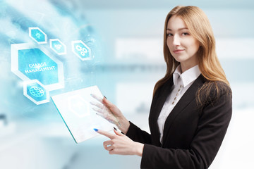 The concept of business, technology, the Internet and the network. A young entrepreneur working on a virtual screen of the future and sees the inscription: Change management