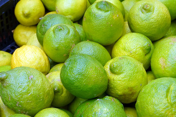green lemons at the market