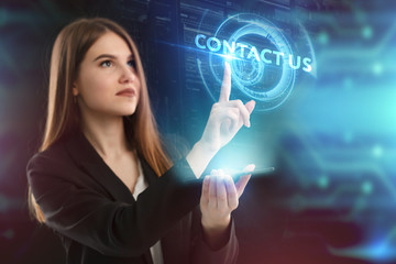 The concept of business, technology, the Internet and the network. A young entrepreneur working on a virtual screen of the future and sees the inscription: Contact us
