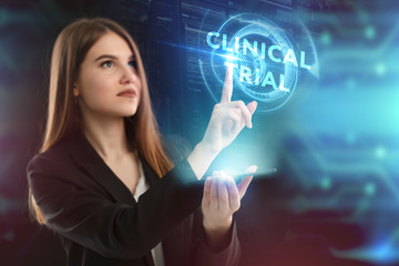 The concept of business, technology, the Internet and the network. A young entrepreneur working on a virtual screen of the future and sees the inscription: Clinical trial