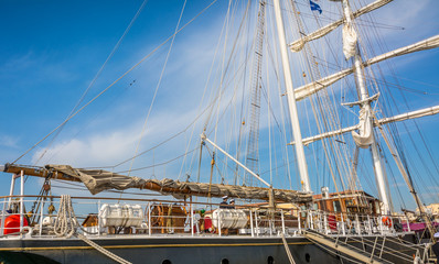Obraz premium 'Nave Italia' moored at the Port of Livorno. it is a brigantine, active as a sail training vessel for the Italian Navy. Nave Italia is the biggest sailing brig in the world