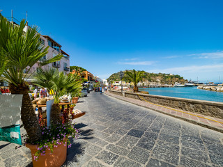 Lacco Ameno, Corso Angelo Rizzoli, beach with colorful houses and restaurant, island of Ischia,...