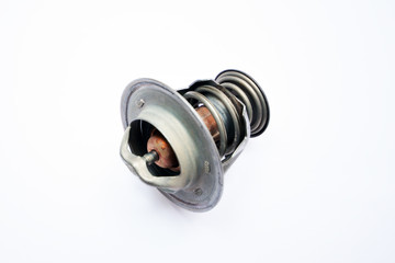 Broken thermostat of the car on an isolated white background