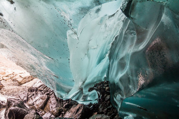 Inside small glacier cave in Iceland nature