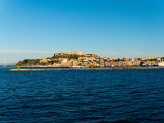 Fototapeta na wymiar Island Procida with colorful houses in the morning and Marina di Sancio Cattolico, Naples, Gulf of Naples, Campania, Italy
