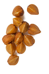 buckwheat or white background, macro. Buckwheat on a white background, macro. Buckwheat grain extreme closeup. Isolated on. 