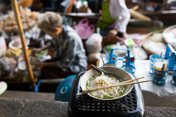 Close up of noodle at damnoen saduak floating market ,Thailand.