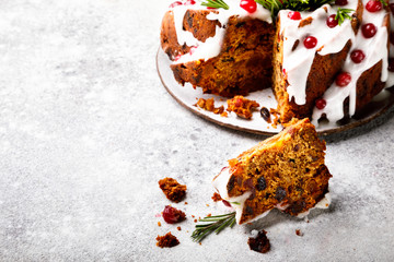 Christmas fruit cake, pudding on gray background. New Year pastries Holidays Concept Copy space for Text..