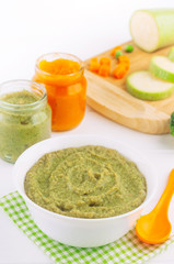 Broccoli puree on the light background near ingredients