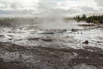 Steam on Geysir Strokkur before eruption in Iceland