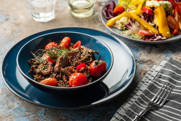 Soba noodles with beef, mushrooms, cherry tomato and sweet peppers