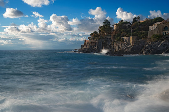 Rocky cliffs and surf along the coast at Bogliasco