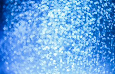 Obraz premium Glitter paper background. Festive sparkle texture. Decorative element for party, birthday, New Year design