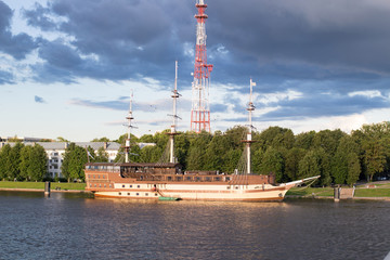 Fototapeta na wymiar The ship stands on the bank of the river in summer
