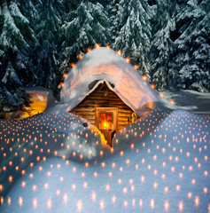 fairy-tale snow-covered house in the mountains