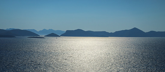 Aerial seascape view to turquoise waters of Adriatic Sea and islands, near town Dubrovnik in...