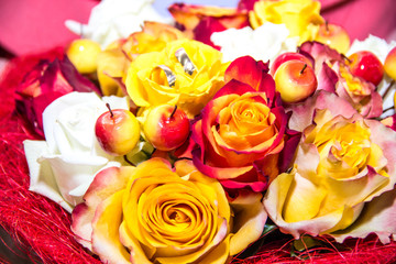 Wedding rings in a bouquet of flowers