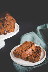 Homemade gingerbread cake on white plate. Honey cake.