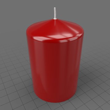 Small red pillar candle