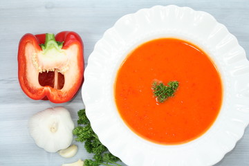 Red pepper cream soup with garlic.