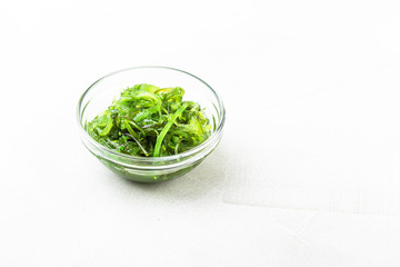 Wakame seaweed salad with sesame seed. Traditional Japanese food.