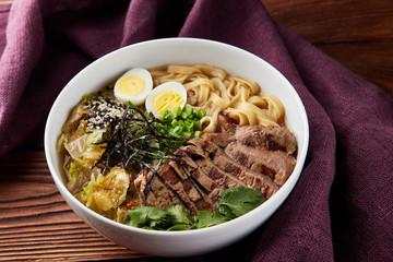 Asian ramen noodle soup with veal