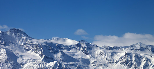 Panoramic view on snowy sunlight mountains and glacier in nice sunny evening