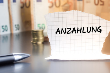 Anzahlung schriftlich auf einem Notizzettel