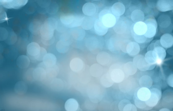 Freezing blue tone bokeh of lights at night for background. Copy space.