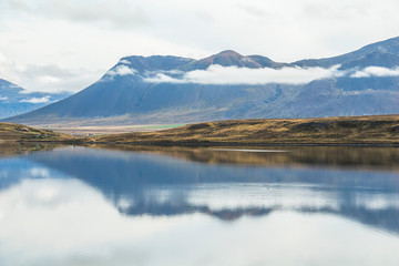 Water reflection on silent lake in Iceland