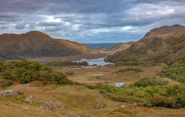 Fototapeta na wymiar Ladies View, a scenic panorama on the Ring of Kerry, Killarney National Park, Ireland. The name stems from the admiration of the view given by Queen Victoria's ladies-in-waiting