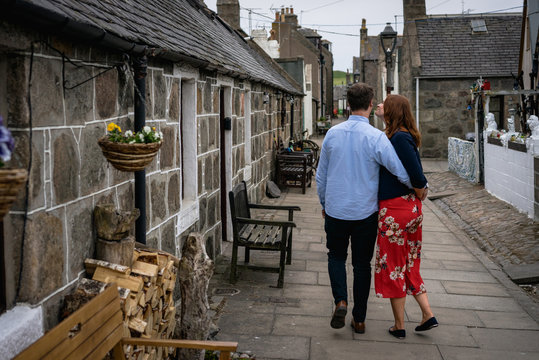 Couple walking through town