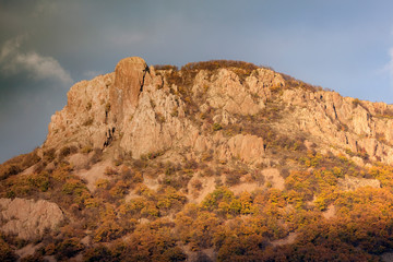 Colorful rock from the Rhodope Mountain over the Studen Kladenets Dam, Bulgaria.