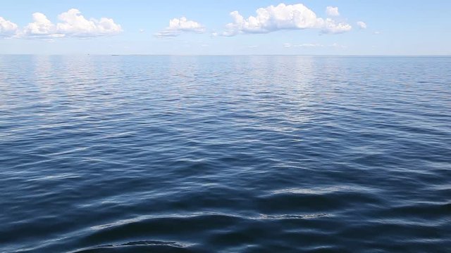 Sailing in the quiet and still windless tranquil ocean