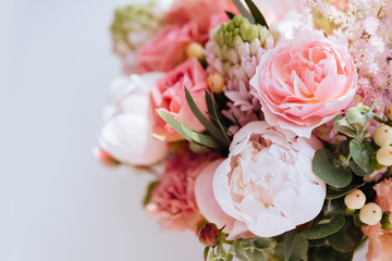 Beautiful blossoming flowers: peonies, roses, ranunculus, tulips, carnations,eustoma lisianthks hydrangea in tender pink colour