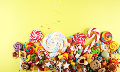 candies with jelly and sugar. colorful array of different childs sweets and treats.