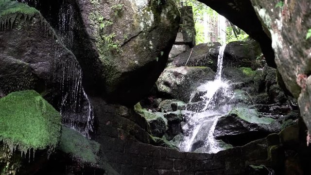 Tilt down, flowing waterfall in Germany