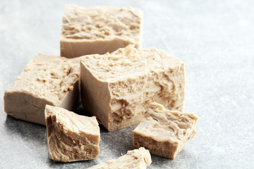 Dry yeast crumbled and yeast block for baking