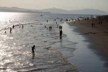 People in the ocean silhouette