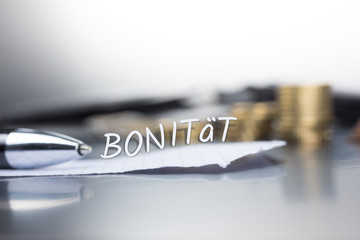 Bonität auf einem Zettel im Büro