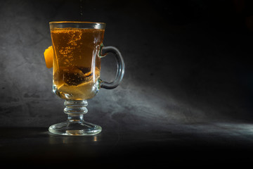 Just bioled glass of black tea