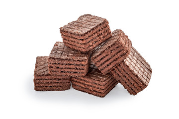 heap of chocolate square brownie wafer biscuits isolated on white