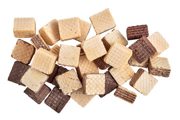 A pile of mixed assorted square wafer biscuits